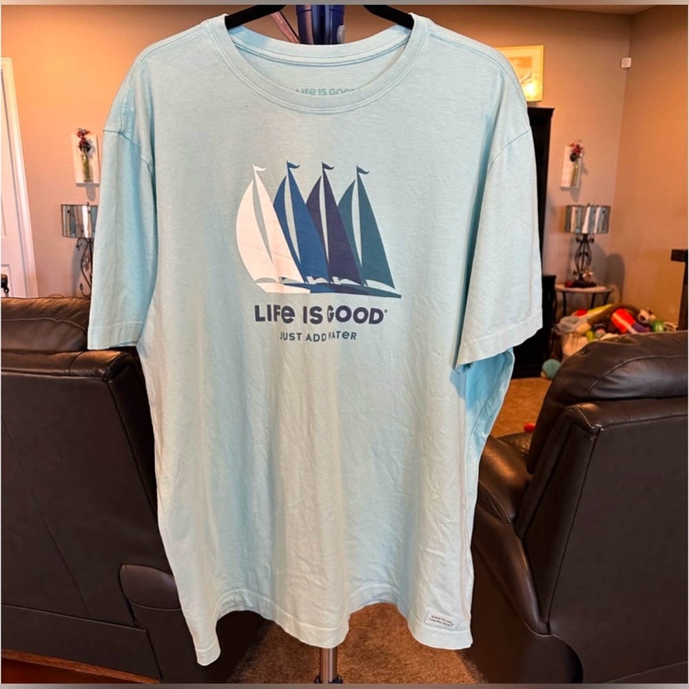 Life is Good light green with sail boats says just add water. Size XL